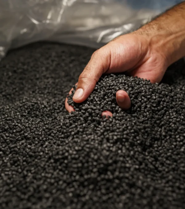 close-up-of-male-hand-holding-plastic-polymer-gran-2025-02-24-15-00-27-utc